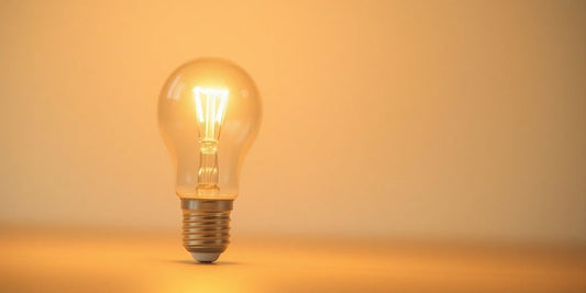 Photograph of a glowing 2W LED E27 bulb.