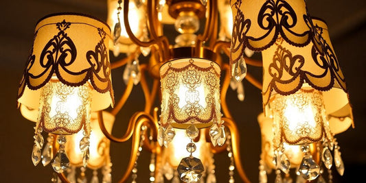Luxurious chandelier with ornate lamp shades.