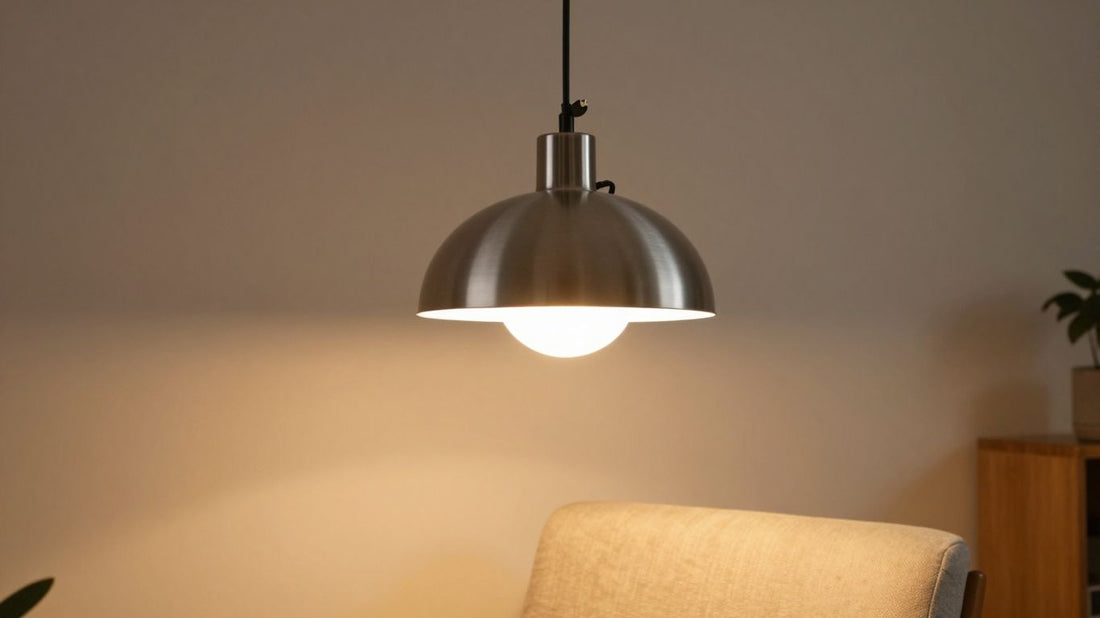 Modern plug-in hanging lamp above an armchair.